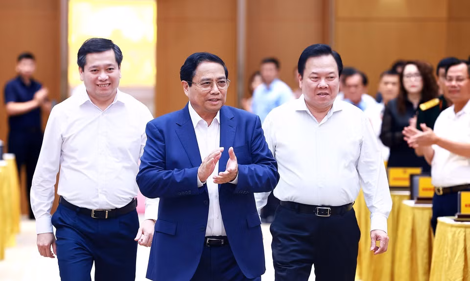 Thủ tướng Phạm Minh Chính đến Hội nghị Thủ tướng Chính phủ làm việc với doanh nghiệp nhà nước. (Ảnh: Dương Giang/TTXVN)