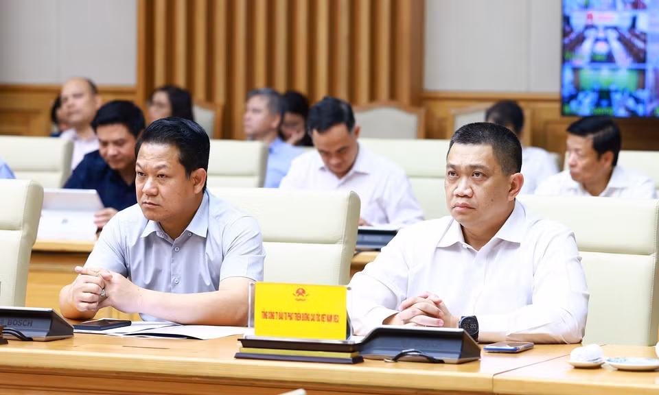 Đại diện các nhà thầu, đơn vị thi công tham dự phiên họp. (Ảnh: Dương Giang/TTXVN)