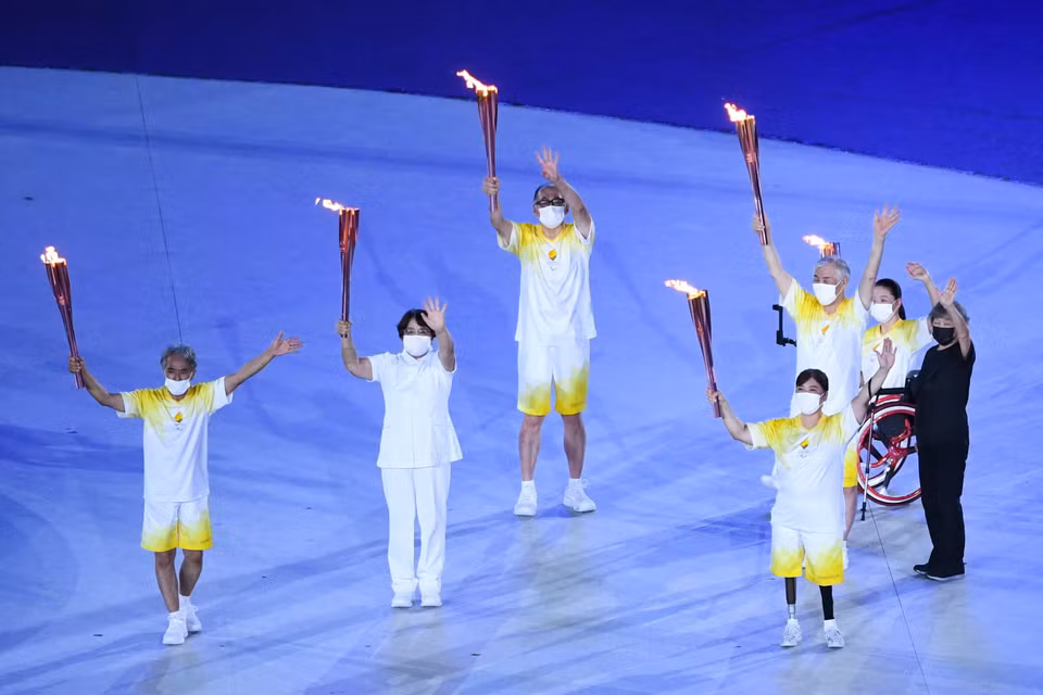 Rước đuốc Paralympic tại Lễ khai mạc Paralympic Tokyo 2020 ở Tokyo, Nhật Bản, ngày 24/8/2021. (Ảnh: THX/TTXVN)