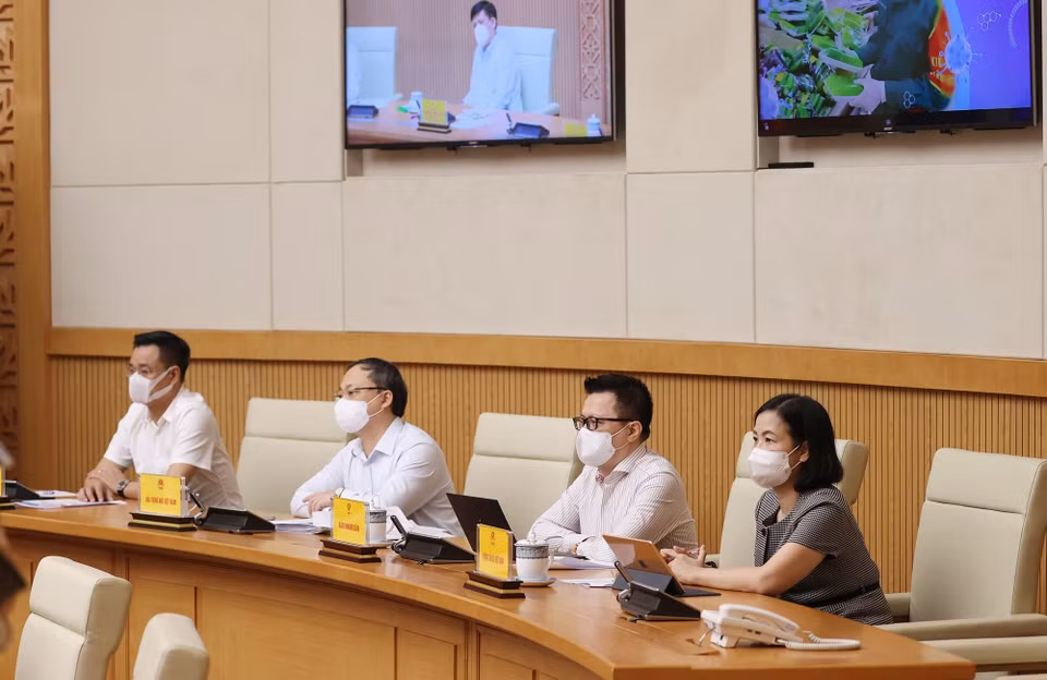 Đại diện lãnh đạo các cơ quan báo chí tham dự tại điểm cầu Chính phủ. (Ảnh: Dương Giang/TTXVN)