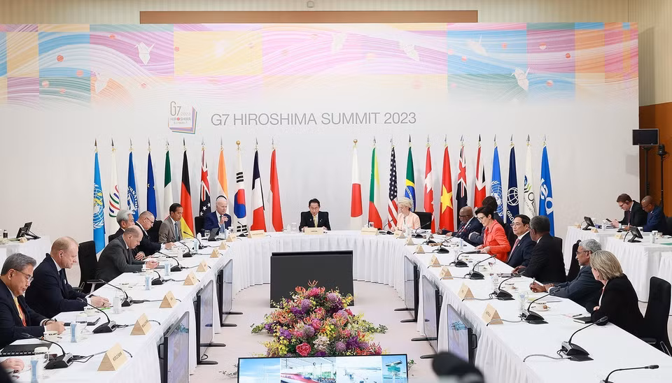 Chiều 20/5 tại Hiroshima, Nhật Bản, Thủ tướng Phạm Minh Chính và trưởng đoàn Nhóm các nước công nghiệp phát triển (G7) mở rộng tham dự phiên thảo luận đối tác về cơ sở hạ tầng và đầu tư toàn cầu. (Ảnh: Dương Giang/TTXVN)