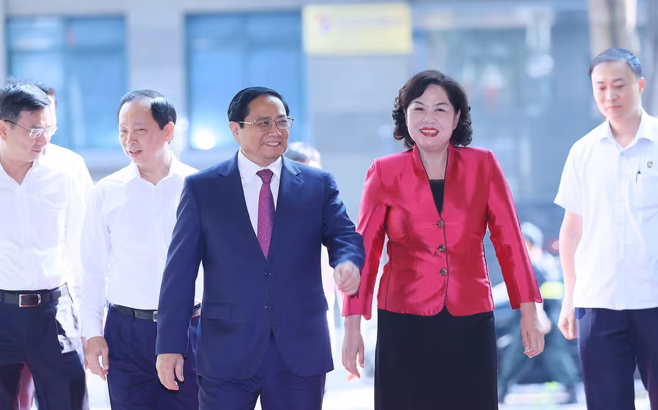 Sáng 15/7, tại Hà Nội, Thủ tướng Phạm Minh Chính tới dự hội nghị sơ kết hoạt động ngân hàng 6 tháng đầu năm và triển khai nhiệm vụ 6 tháng cuối năm 2023, do Ngân hàng Nhà nước Việt Nam tổ chức. (Ảnh: Dương Giang/TTXVN)