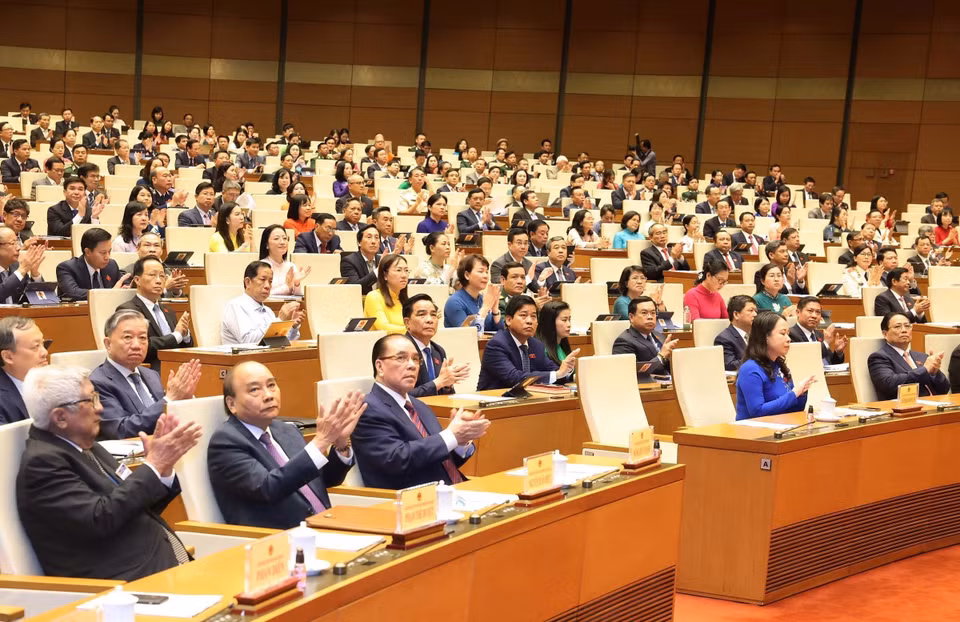 Các đồng chí lãnh đạo, nguyên lãnh đạo Đảng, Nhà nước và đại biểu dự phiên khai mạc. (Ảnh: TTXVN)