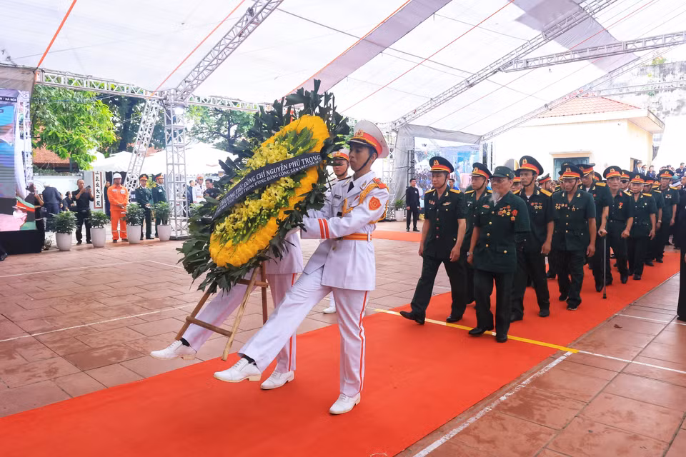 Hội thương binh nặng huyện Đông Anh vào viếng Tổng Bí Thư Nguyễn Phú Trọng. (Ảnh: TTXVN)