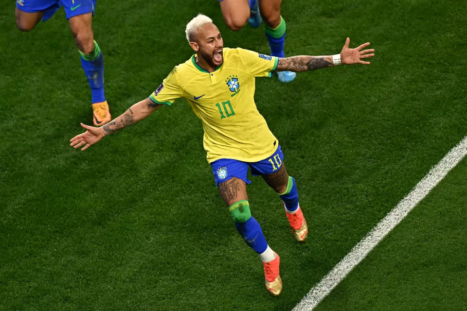 ...và là bàn thắng thứ 77 cho đội tuyển Brazil. (Ảnh: AFP/TTXVN)