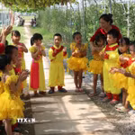 Việc nâng cao trình độ đạt chuẩn của đội ngũ giáo viên là hoạt động quan trọng nâng cao chất lượng giáo dục. (Ảnh: Thu Hoài/TTXVN)