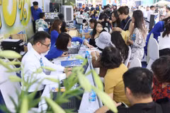 Hội chợ Du lịch quốc tế VITM Hà Nội luôn thu hút đông đảo sự quan tâm của công chúng. (Ảnh: Mai Mai/Vietnam+)