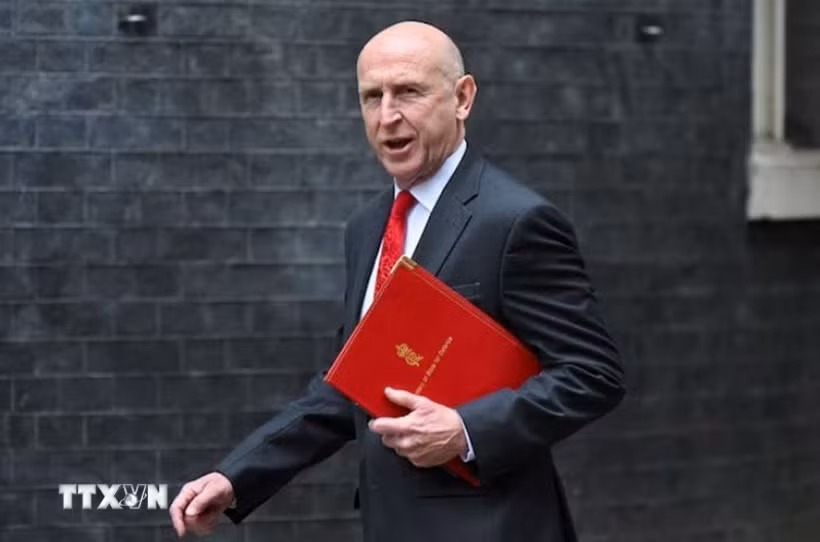 Bộ trưởng Quốc phòng Anh John Healey. (Ảnh: REUTERS/TTXVN)