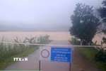 Một điểm ngập sâu trên tuyến đường qua xã miền núi Kiên Thọ, Thanh Hóa. (Ảnh: TTXVN phát)