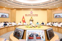 Hội nghị làm việc giữa Ban Thường vụ, lãnh đạo Bộ Công Thương với Giám đốc Sở Công Thương và Chi cục trưởng Quản lý thị trường các tỉnh, thành phố trực thuộc Trung ương. (Ảnh: PV/Vietnam+)