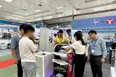 Doanh nghiệp tham gia triển lãm VietOffice. (Ảnh: Đức Duy/Vietnam+)