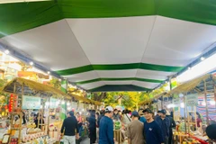 Các hoạt động xúc tiến thương mại, kết nối giao thương, kích cầu tiêu dùng và hỗ trợ các chủ thể OCOP được đẩy mạnh. (Ảnh: Vietnam+)