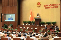 Quốc hội nghe Tờ trình và báo cáo thẩm tra dự thảo Nghị quyết của Quốc hội về phổ cập giáo dục mầm non cho trẻ em mẫu giáo từ 3 đến 5 tuổi. (Ảnh: An Đăng/TTXVN) 