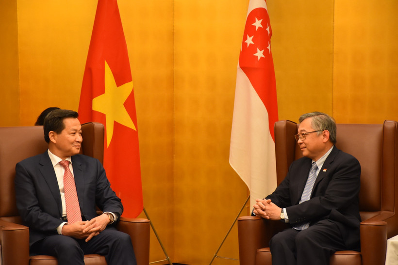 Phó Thủ tướng Lê Minh Khái tiếp Phó Thủ tướng Singapore Gan Kim Yong. (Ảnh: Nguyễn Tuyến/TTXVN)