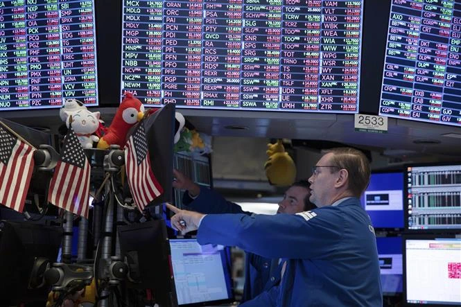 Giao dịch viên tại Sàn giao dịch chứng khoán New York, Mỹ, ngày 14/8/2019. (Ảnh: THX/ TTXVN)