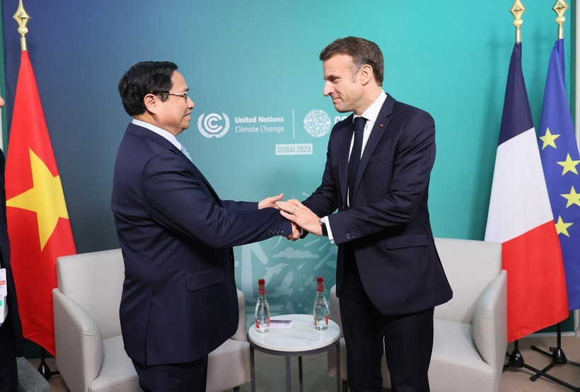 Thủ tướng Phạm Minh Chính gặp Tổng thống Pháp Emmanuel Macron. (Ảnh: Dương Giang/TTXVN)