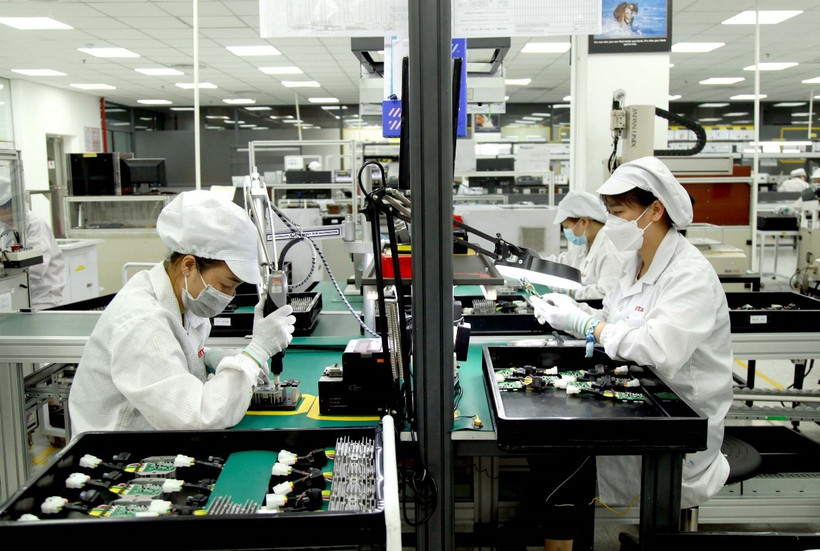 Công nhân làm việc tại tại Công ty Trách nhiệm Hữu hạn Star Engineers Việt Nam, Khu công nghiệp Bình Xuyên (Vĩnh Phúc). (Ảnh: Hoàng Hùng/TTXVN)