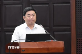 Ông Trần Trung Sơn, Phó Giám đốc Sở Nội vụ, Ủy viên Ủy ban bầu cử thành phố Đà Nẵng phát biểu tại Hội nghị. (Ảnh: Quốc Dũng/TTXVN)