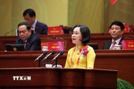 Đồng chí Nguyễn Thị Thanh, Ủy viên Trung ương Đảng, Ủy viên Ban Thường vụ Đảng ủy Quốc hội, Phó Chủ tịch Quốc hội, tham luận về vấn đề “Nâng cao tính Đảng, tính Nhân dân trong hoạt động của Quốc hội đáp ứng yêu cầu hoàn thiện thể chế phát triển đất nước trong kỷ nguyên mới.” (Ảnh: TTXVN)