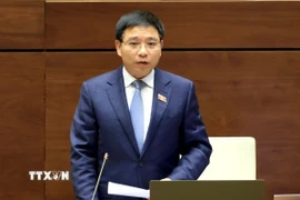 Bộ trưởng Bộ Tài chính Nguyễn Văn Thắng giải trình, làm rõ một số vấn đề đại biểu Quốc hội nêu. (Ảnh: Tuấn Anh/TTXVN)