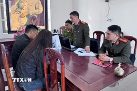 Trường hợp V.X.H làm việc với cơ quan công an. (Ảnh: TTXVN phát)