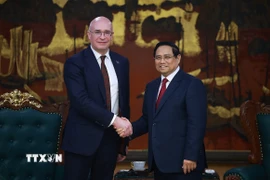 Thủ tướng Phạm Minh Chính tiếp Tổng giám đốc Hãng Thông tấn TASS (Liên bang Nga) Andrey Kondrashov. (Ảnh: Dương Giang/TTXVN)