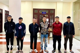 Các đối tượng cho vay lãi nặng hơn 600%/năm bị khởi tố và tạm giam. (Ảnh: TTXVN phát)