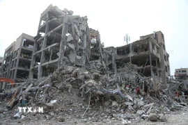 Những tòa nhà bị phá hủy sau các cuộc tấn công tại Tehran, Iran, ngày 12/3/2026. (Ảnh: THX/TTXVN)