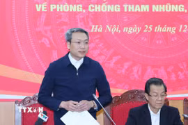 Thiếu tướng Nguyễn Quốc Toàn, Chánh Văn phòng, Người phát ngôn Bộ Công an trả lời câu hỏi của phóng viên. (Ảnh: Phương Hoa/TTXVN)