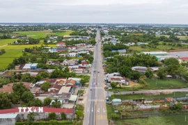 Quốc lộ 22B, tuyến đường huyết mạch nối Thành phố Hồ Chí Minh với Cửa khẩu quốc tế Mộc Bài, tỉnh Tây Ninh, chưa đáp ứng nhu cầu vận chuyển, chờ cao tốc Thành phố Hồ Chí Minh-Mộc Bài để giảm áp lực vận chuyển. (Ảnh: Giang Phương/TTXVN)