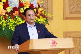 Thủ tướng Phạm Minh Chính chủ trì cuộc họp với Hội đồng Tư vấn chính sách về phát triển kinh tế tư nhân. (Ảnh: Dương Giang/TTXVN)