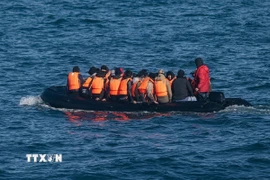 Người di cư. (Ảnh: Getty Images/TTXVN)