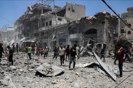 Cảnh đổ nát do chiến sự tại Dải Gaza. (Ảnh: THX/TTXVN)