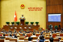 Quốc hội biểu quyết thông qua Luật Công nghệ cao (sửa đổi). (Ảnh: Doãn Tấn/TTXVN)