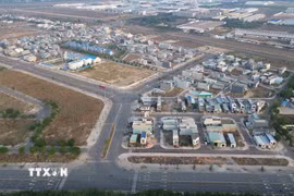 Hàng loạt gia đình đã xây nhà, ổn định cuộc sống tại Khu tái định cư Lộc An-Bình Sơn (thành phố Đồng Nai). (Ảnh: Công Phong/TTXVN)