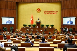 Bộ trưởng Bộ Nông nghiệp và Môi trường Trần Đức Thắng giải trình, làm rõ một số vấn đề đại biểu Quốc hội nêu. (Ảnh: Doãn Tấn/TTXVN)