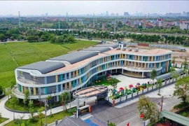 Một trường học được đầu tư, xây mới, sẵn sàng đón học sinh bước vào năm học mới. (Ảnh: TTXVN phát)