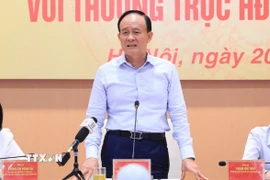 Chủ tịch Hội đồng Nhân dân thành phố Hà Nội, Phó Trưởng đoàn Đại biểu Quốc hội thành phố Hà Nội Nguyễn Ngọc Tuấn phát biểu tại hội nghị giao ban với Thường trực Hội đồng Nhân dân quận, huyện, thị xã. (Ảnh: TTXVN phát)