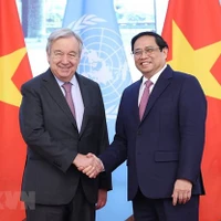 Thủ tướng Phạm Minh Chính và Tổng Thư ký Liên hợp quốc António Guterres. (Ảnh: Dương Giang/TTXVN)