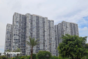 Nhiều người có nhu cầu mua nhà nhưng vẫn chưa thể có cơ hội do nhiều địa phương chưa quan tâm chỉ đạo. (Ảnh: Vietnam+)