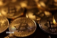 Đồng tiền kỹ thuật số Bitcoin. (Ảnh: Reuters/TTXVN)