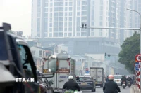 Việc lắp đặt và triển khai hệ thống Camera AI trên các tuyến phố sẽ giúp nâng cao ý thức tham gia giao thông của người dân. (Ảnh: Phạm Kiên/TTXVN)