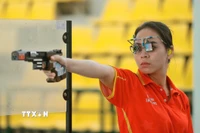Xạ thủ Trịnh Thu Vinh quyết tâm giành HCV tại SEA Games 33. (Ảnh: Minh Quyết/TTXVN)