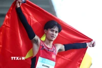 Nguyễn Trung Cường giúp Điền kinh lập "hat-trick vàng" trong ngày hôm nay. (Ảnh: TTXVN phát)