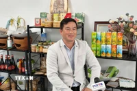 Ông Nguyễn Thanh Bình, CEO của Công ty KQ Trading, Chủ tịch Hội Logistics và Đầu tư Việt Nam-Australia trả lời phỏng vấn TTXVN. (Ảnh: Trung Trang/TTXVN)