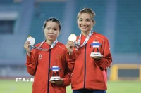 Nguyễn Thị Oanh lần thứ 5 giành HCV chạy 5000m nữ tại SEA Games, Lê Thị Tuyết giành HCB cùng nội dung. (Ảnh: Minh Quyết/TTXVN)