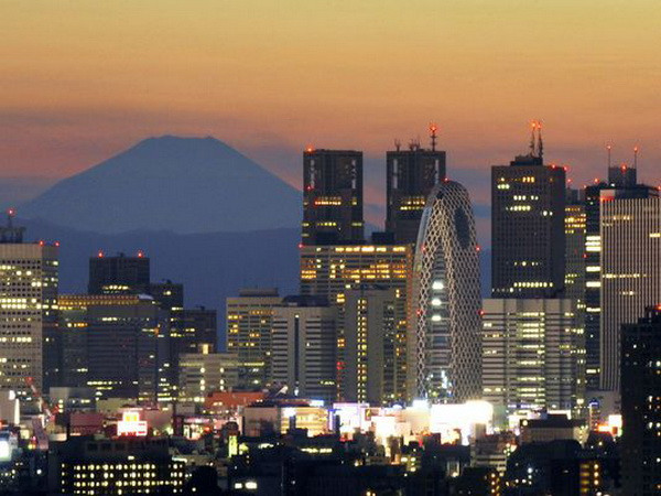 Kinh tế Nhật Bản thoát khỏi suy thoái trong quý cuối 2014 ảnh 1