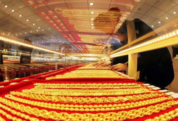 Giá vàng thế giới giảm do số liệu việc làm vượt kỳ vọng của Mỹ ảnh 1