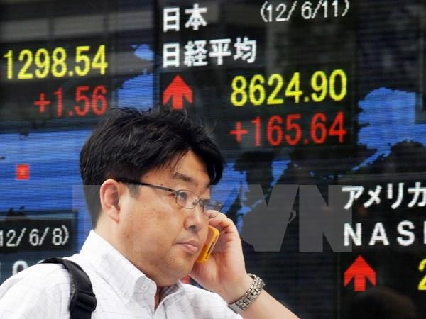 Chỉ số Nikkei của Nhật Bản tăng cao kỷ lục trong vòng 15 năm ảnh 1