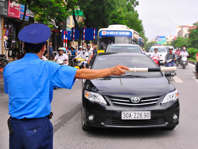 [Photo] Ngày đầu cấm ôtô trên tuyến đường Cầu Giấy - Xuân Thủy ảnh 6
